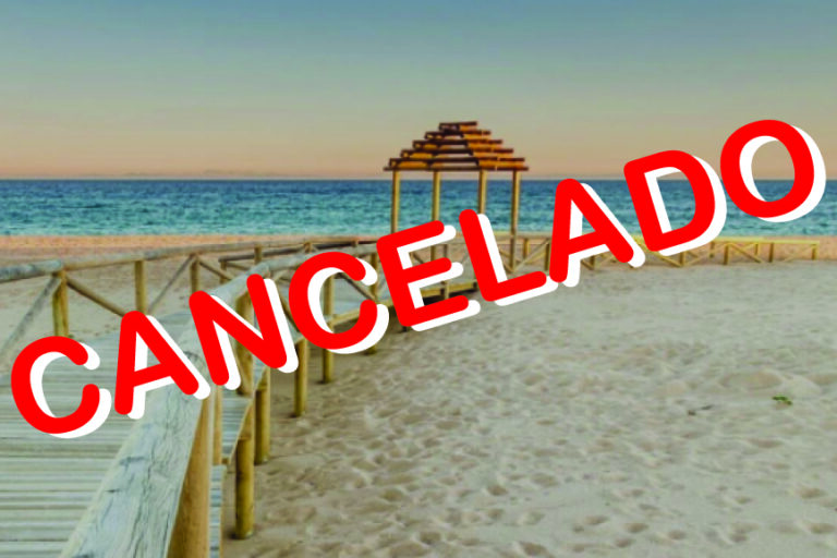 Portada programa vacaciones COCEMFE 2020 cancelado Imagen de un playa con pasarela y la palabra CANCELADO en rojo ocupando la mitad de la imagen.
